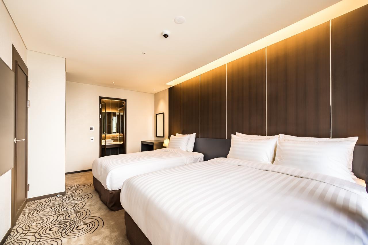 Golden Daisy Hotel Seogwipo Dış mekan fotoğraf